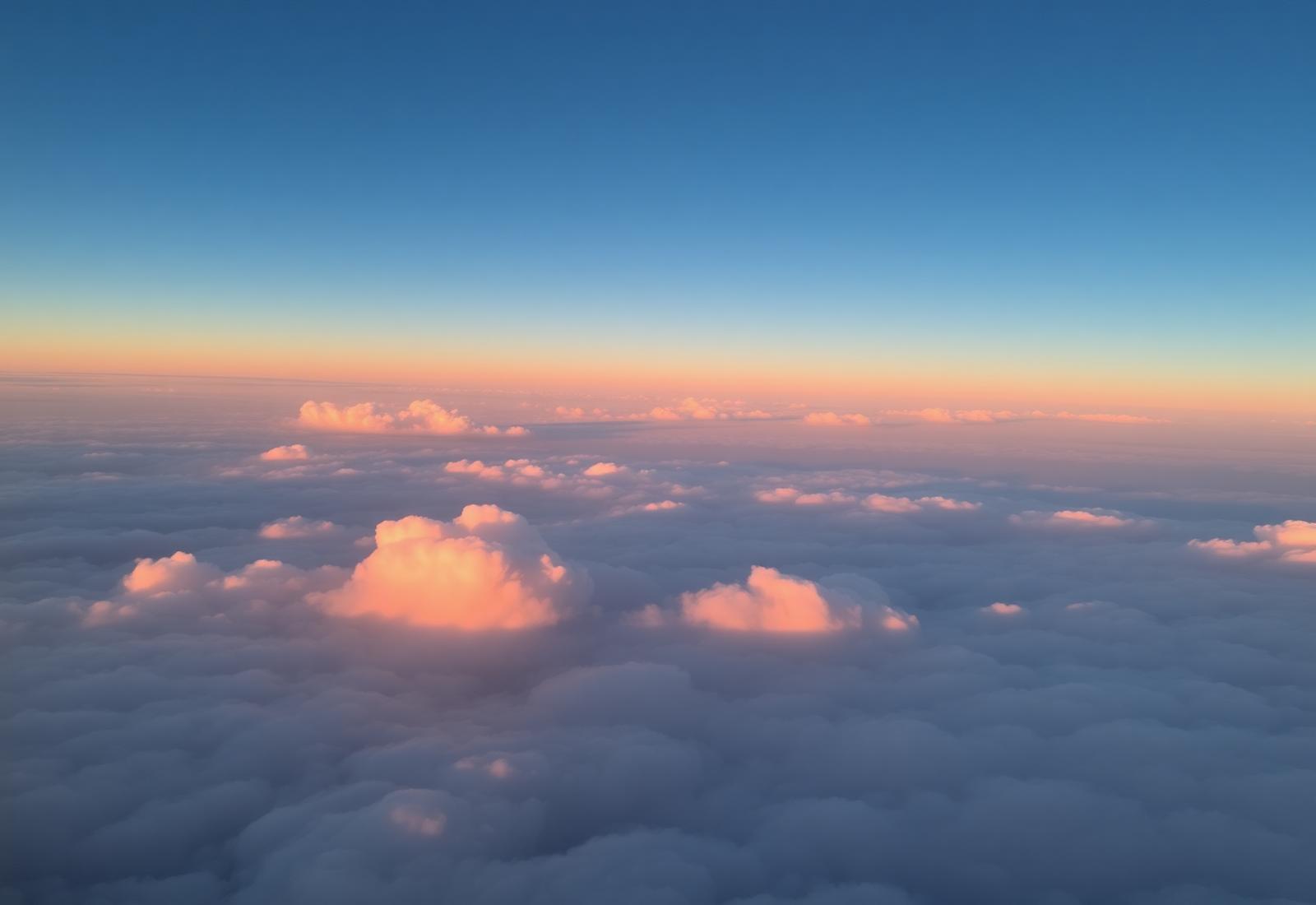 View from above clouds at sunrise